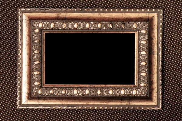 Vintage metalen frame over stof textuur — Stockfoto