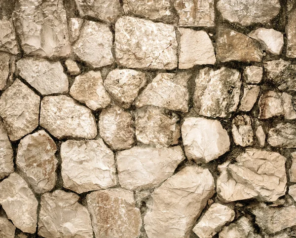Текстура тёмной каменной стены — стоковое фото