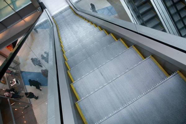 Gray steps of escalator in business center — Stock Photo, Image