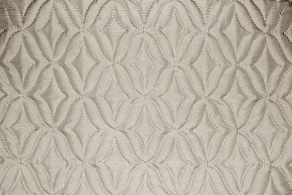 Materiál béžová textilie textura s rhombs — Stock fotografie