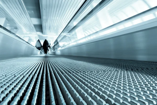 Movement of gray metal escalator with — Stock Photo, Image