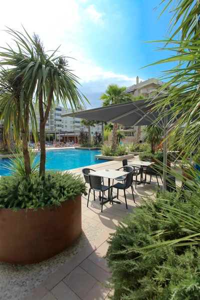 Sunny lounge near the pool — Stock Photo, Image