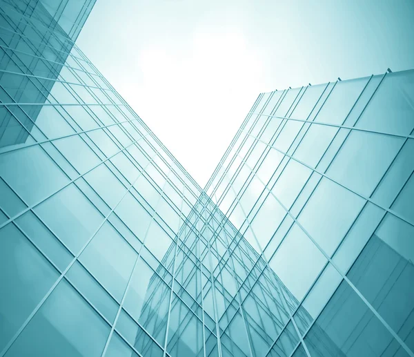 Hedendaagse transparante getextureerde wand van glas wolkenkrabber in bu — Stockfoto