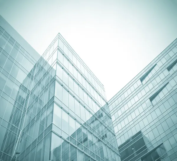 Business background of glass and metallic modern architecture in — Stock Photo, Image