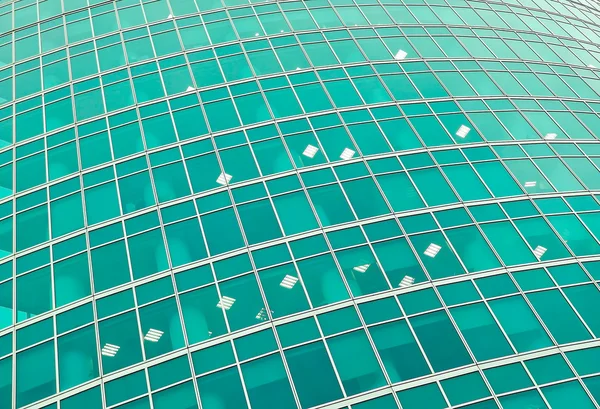 Blauwe glazen wand van moderne gebouw — Stockfoto
