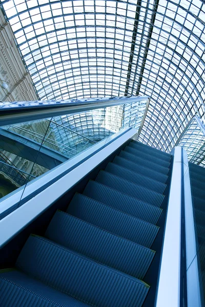 Moving black escalator in office center — Stock Photo, Image