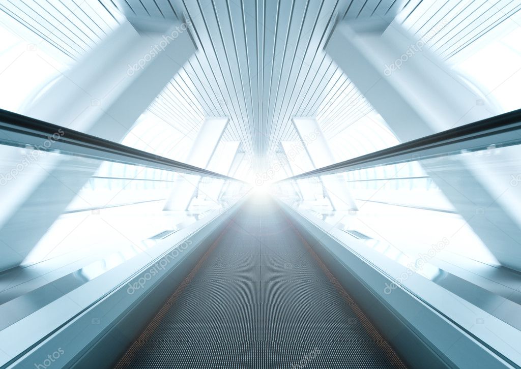 Wide angle of moving symmetric escalator inside contemporary air