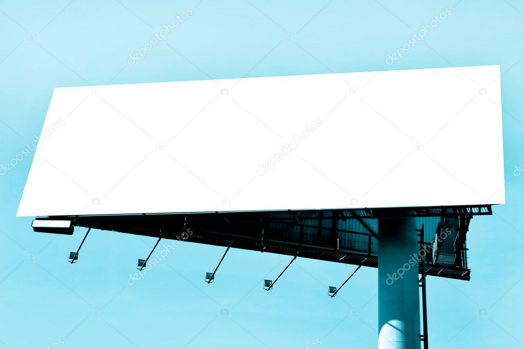 Blank wide billboard over blue sky