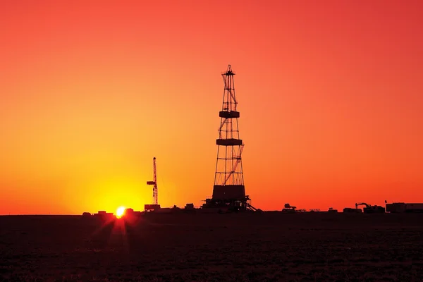 Drilling sunset. Royalty Free Stock Images