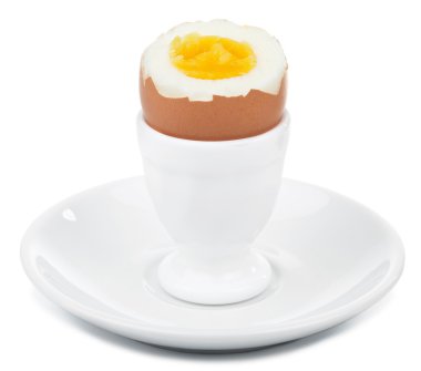 Boiled egg in egg cup isolated clipart