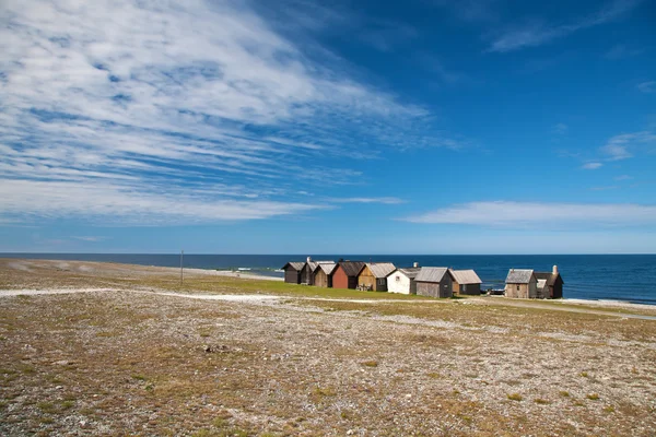 Malé vesnice nedaleko moře na ostrově faru — Stock fotografie
