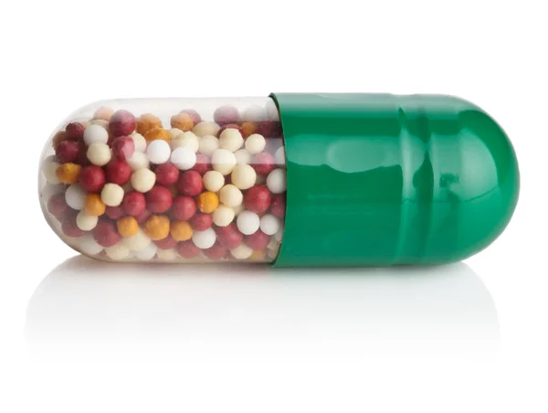 Macro di pillola capsula isolato — Foto Stock