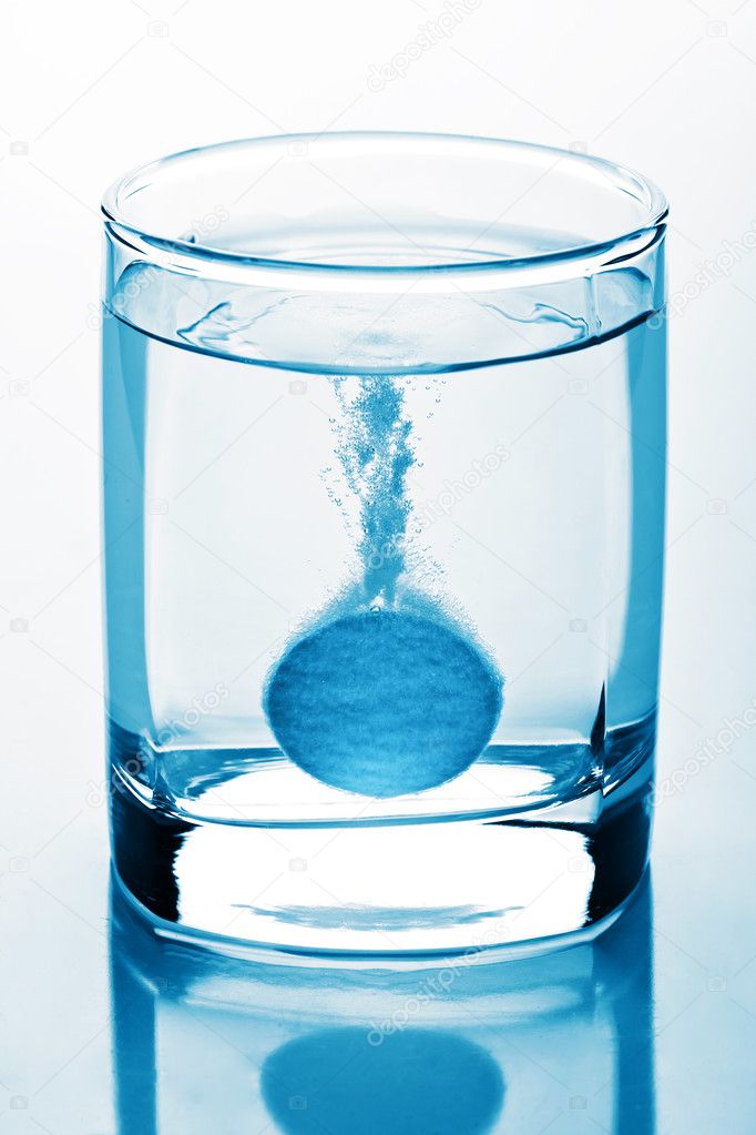 Tablet in glass of water