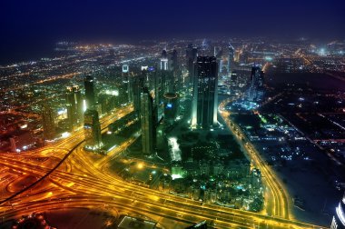 Panorama Dubai city at night. clipart