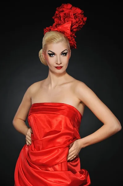 Beautiful lady in red dress — Stock fotografie