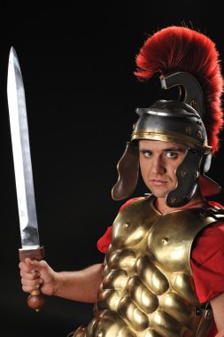 Handsome legionary soldier with a gladius clipart
