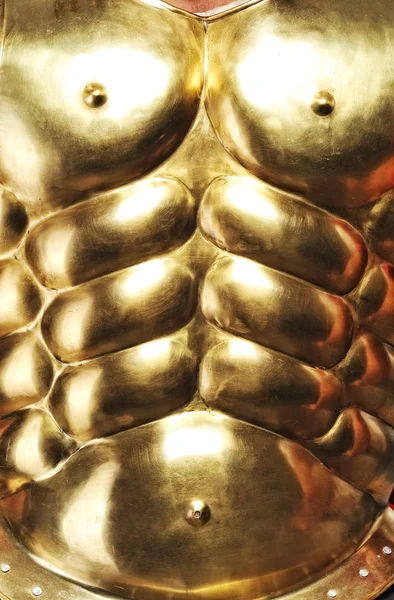 Close-up of golden armour — Stock Photo, Image