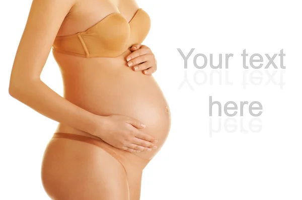 Vackra kroppen av en gravid kvinna — Stockfoto