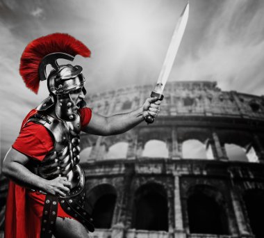 Roman legionary soldier in front of coliseum clipart