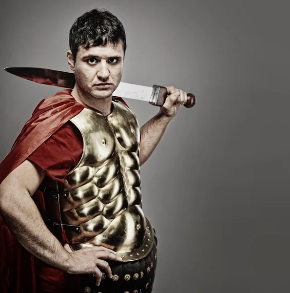 Handsome roman legionary soldier — Stock Photo, Image