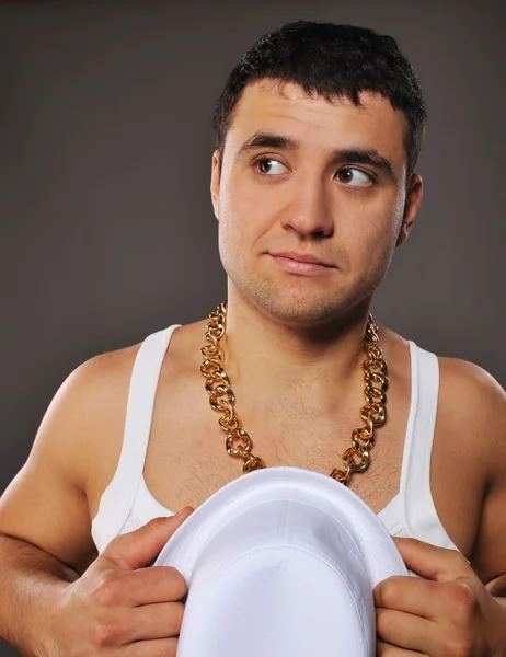Stylový muž hospodářství bílý klobouk — Stock fotografie