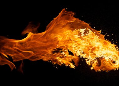 Fire explosion isolated on black background clipart