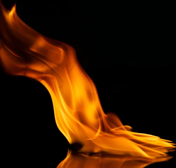 Fire flames reflected in water — Stock Photo, Image