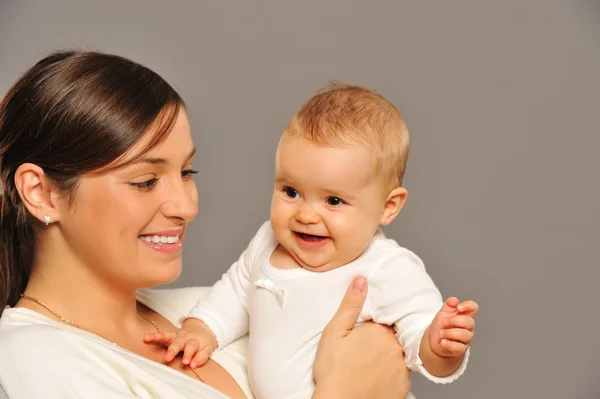 Mother with her adorable baby Royalty Free Stock Photos