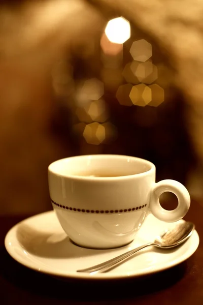 Taza de café sobre fondo abstracto — Foto de Stock
