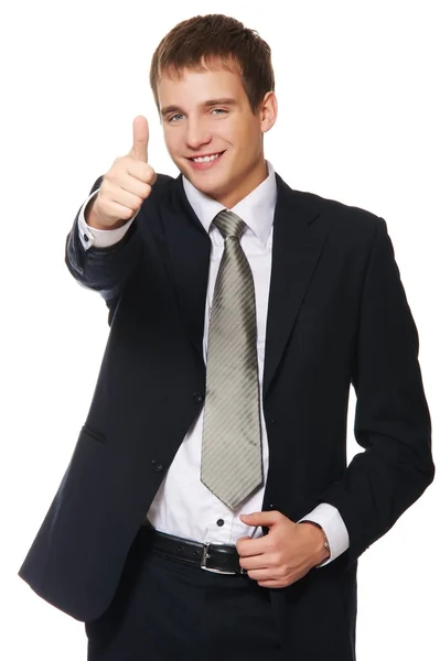 Šťastný podnikatel ukazuje palcem s úsměvem — Stock fotografie