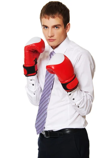 Jeune homme d'affaires avec gants de boxe — Photo