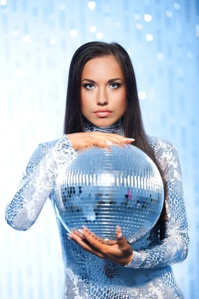 Stylish brunette with a disco ball — Stock Photo, Image