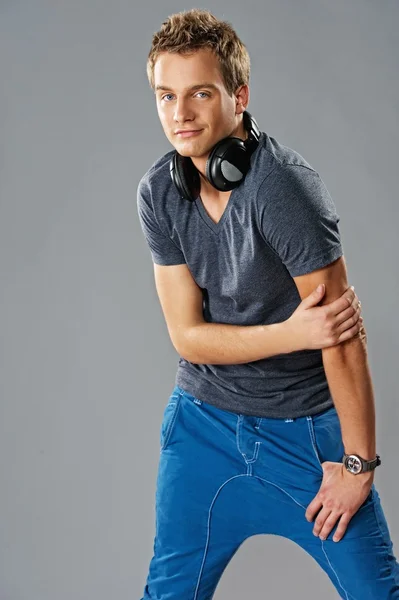 Handsome young man with headphones — Stock Photo, Image