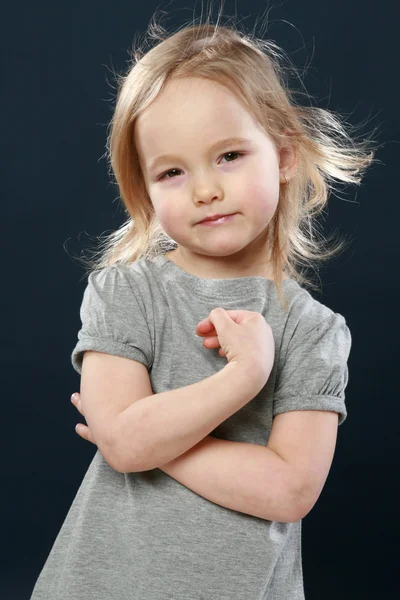 Portrait of a happy young girl in studio — Stock Photo, Image