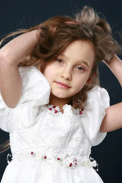 Portrait of a happy young girl in studio — Stock Photo, Image