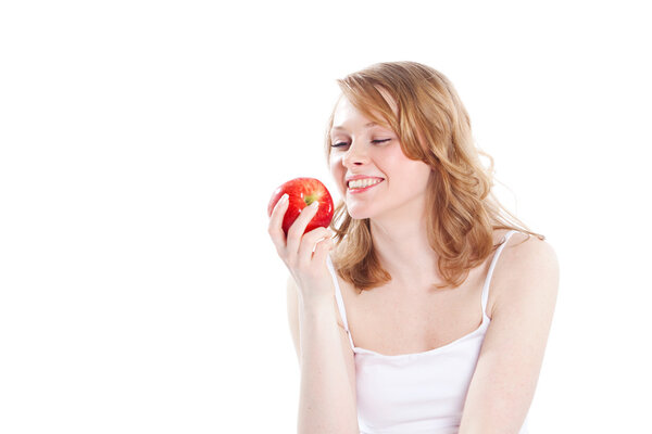 Portrait of beautiful girl with apple