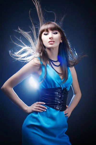 Menina bonita em um vestido azul — Fotografia de Stock