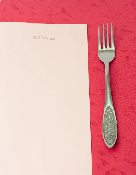 stock image Menu on a red background and cutlery fork