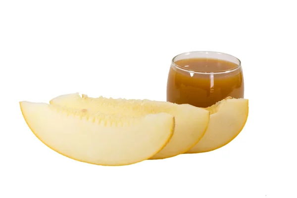 Frutas e sumos de melão isolados a branco — Fotografia de Stock