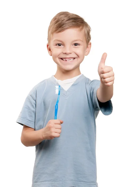 Хлопчик з зубною щіткою — стокове фото