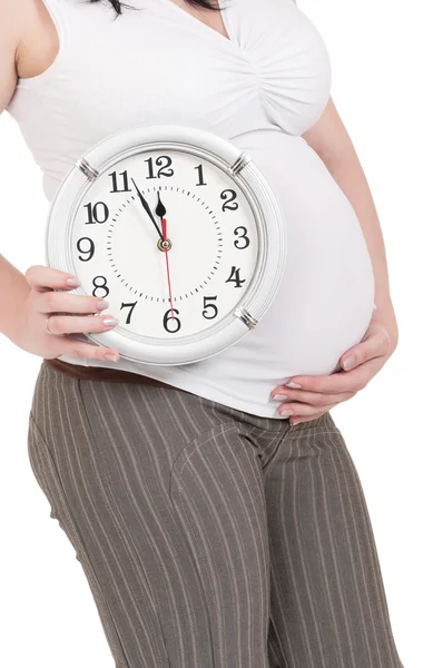 Těhotné břicho hodiny — Stock fotografie