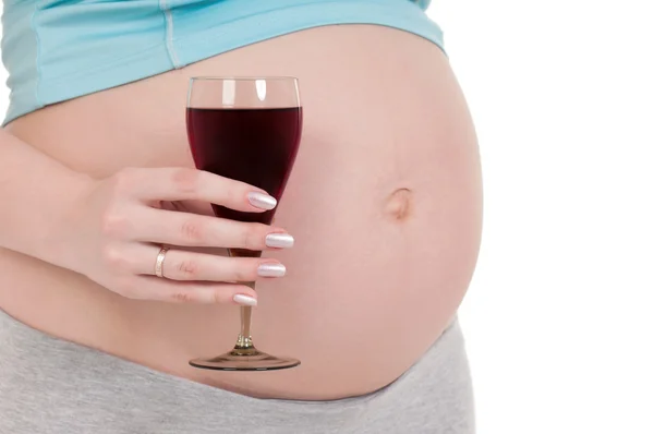 Gravid mage med vin — Stockfoto