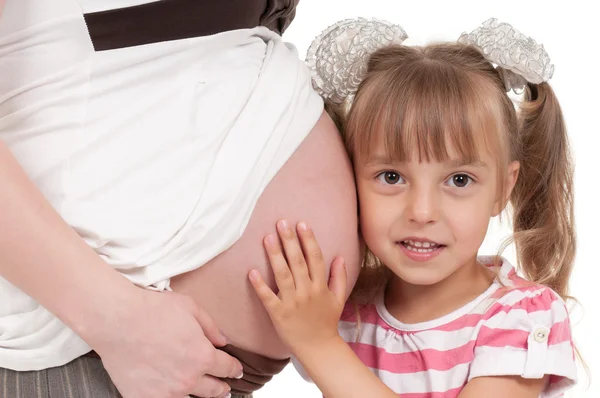 Kobieta w ciąży z córką — Zdjęcie stockowe