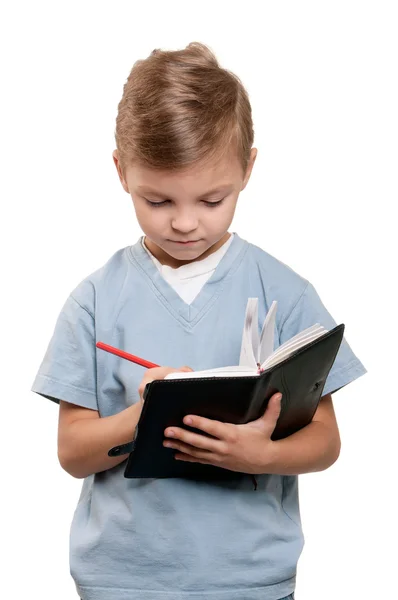 Мальчик с книгой — стоковое фото