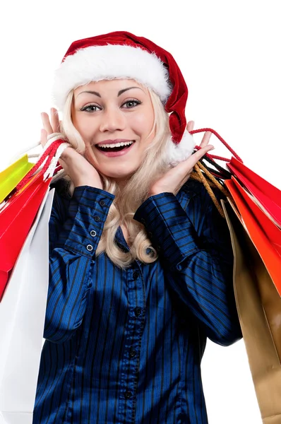Kerstmis vrouw met shopping tassen — Stockfoto