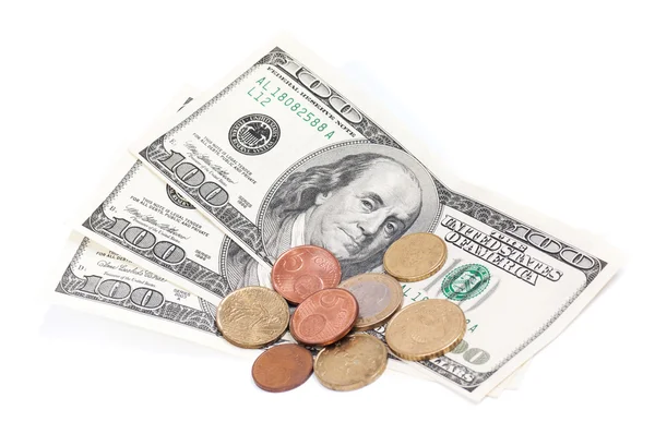 Coins over bills — Stock Photo, Image