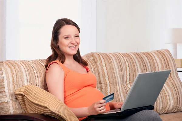 Pregnant woman online purchasing — Stock Photo, Image