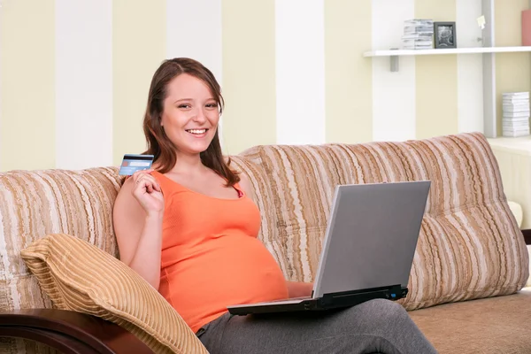 Pregnant woman online purchasing — Stock Photo, Image