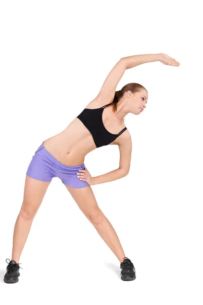 Mulher fitness exercitando exercícios de ginástica — Fotografia de Stock