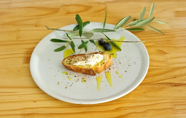 stock image Bread and cheese with oil